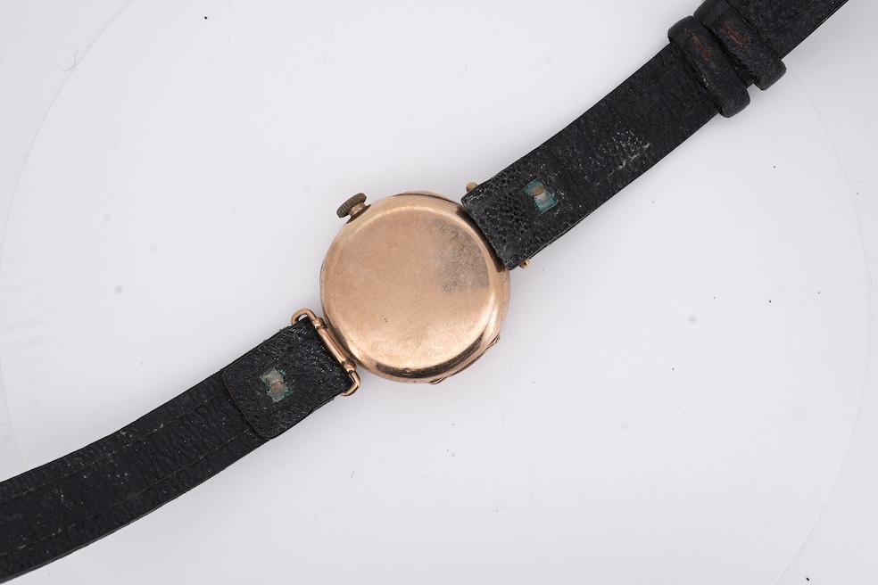 An early 20th century 9ct gold Zenith manual wind wrist watch, retailed by Favre Leuba, with Roman dial and subsidiary seconds, case diameter 28mm, on an associated leather strap. Condition - poor to fair